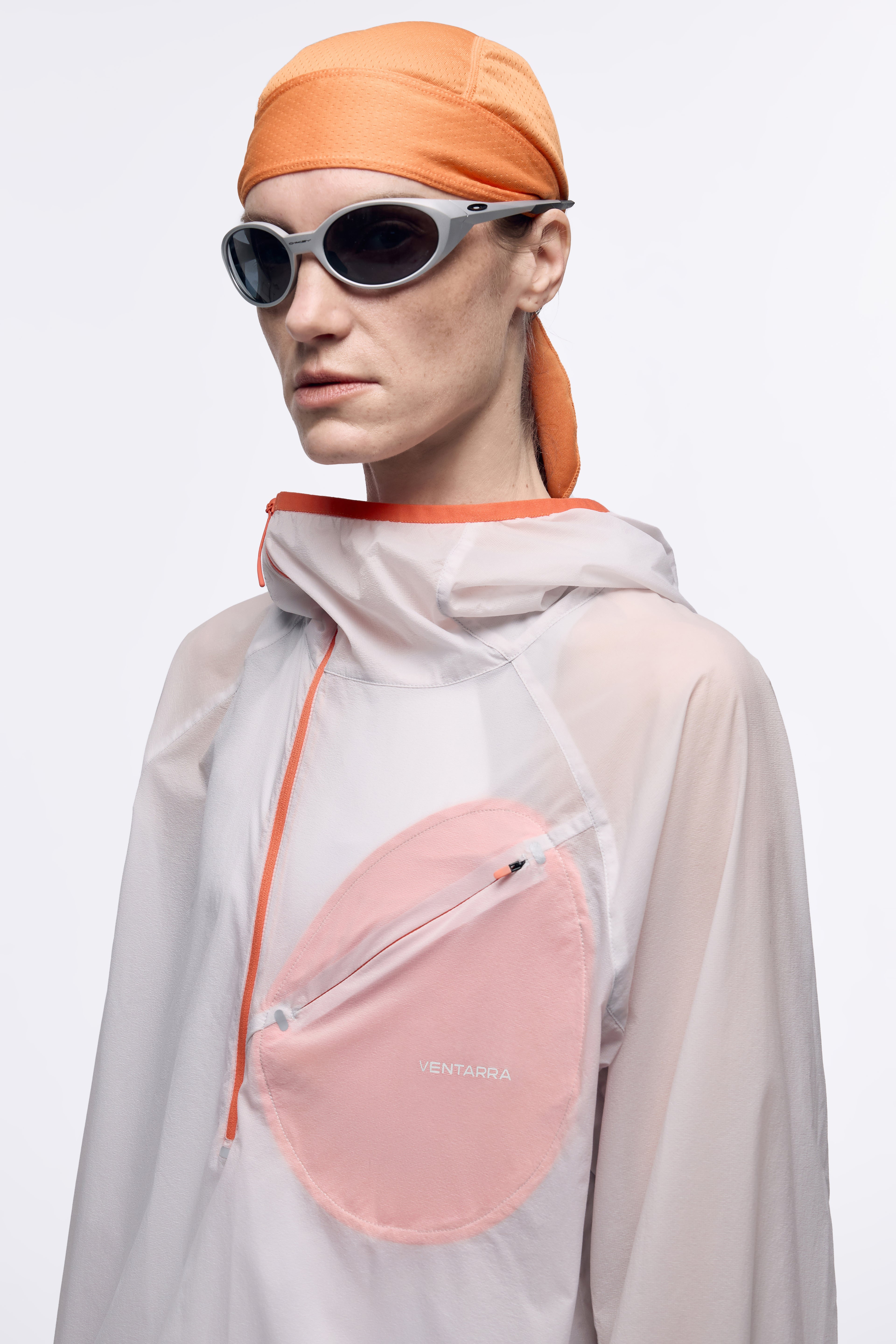 VENTARRA lightweight waterproof trail running jacket featuring breathable translucent fabric, functional pocket design and windproof protection for outdoor adventures