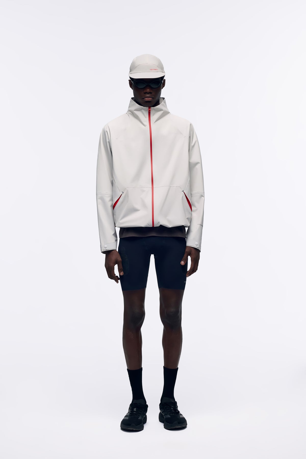 Ventarra unisex bonded shell jacket in Light Gray — front view, hoodless waterproof windbreaker with fully taped seams and clean minimal silhouette
