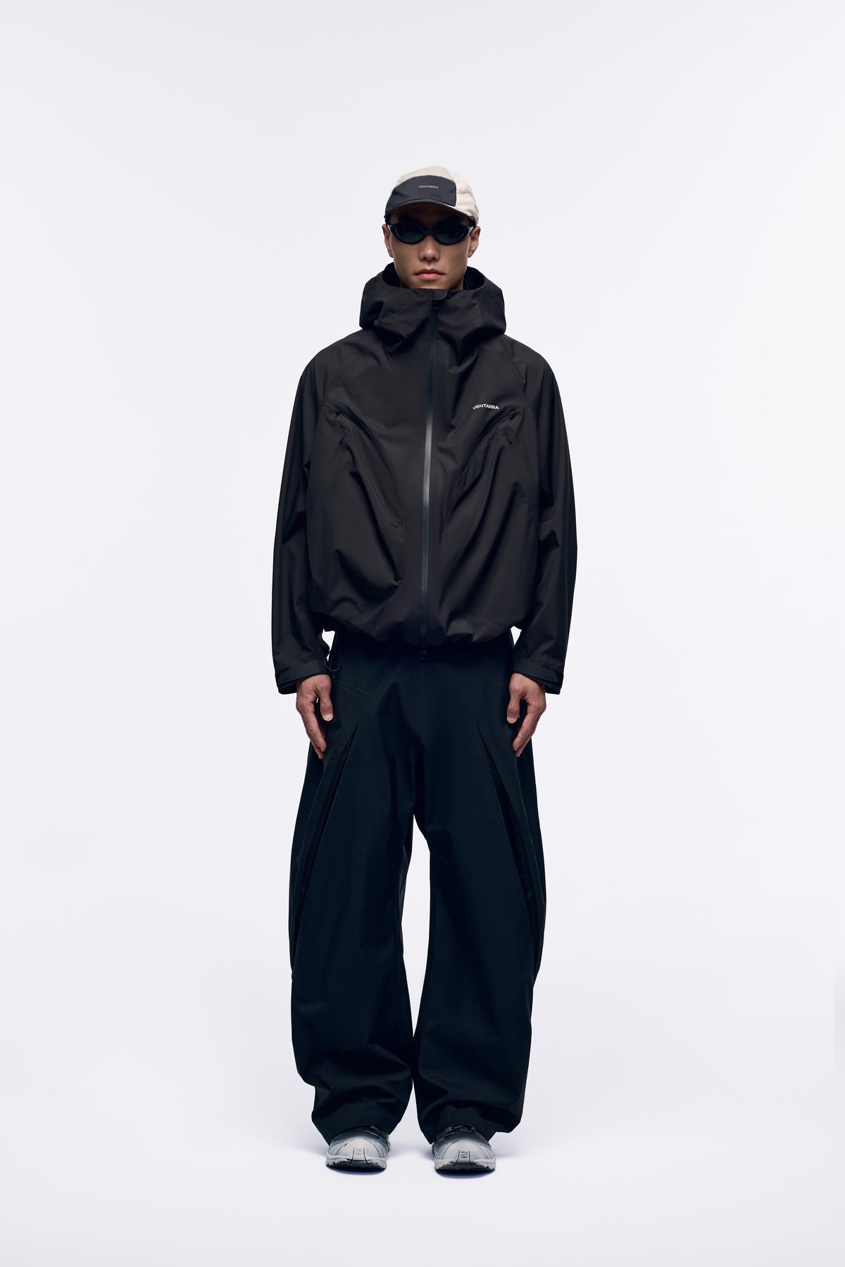 Ventarra unisex hooded shell jacket in Black — waterproof 3-layer composite with semi-structured 4-pocket front panel, ultra-long back vents and 3D adjustable hood