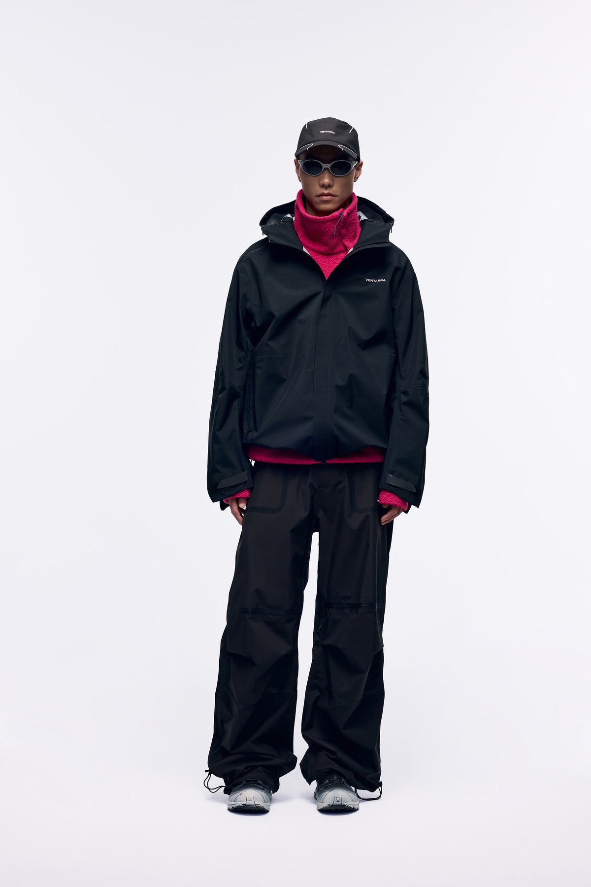 Ventarra unisex side-zip hooded shell jacket in Black — waterproof 3-layer composite with dual side waterproof zippers and ultra-long back concealed vent

