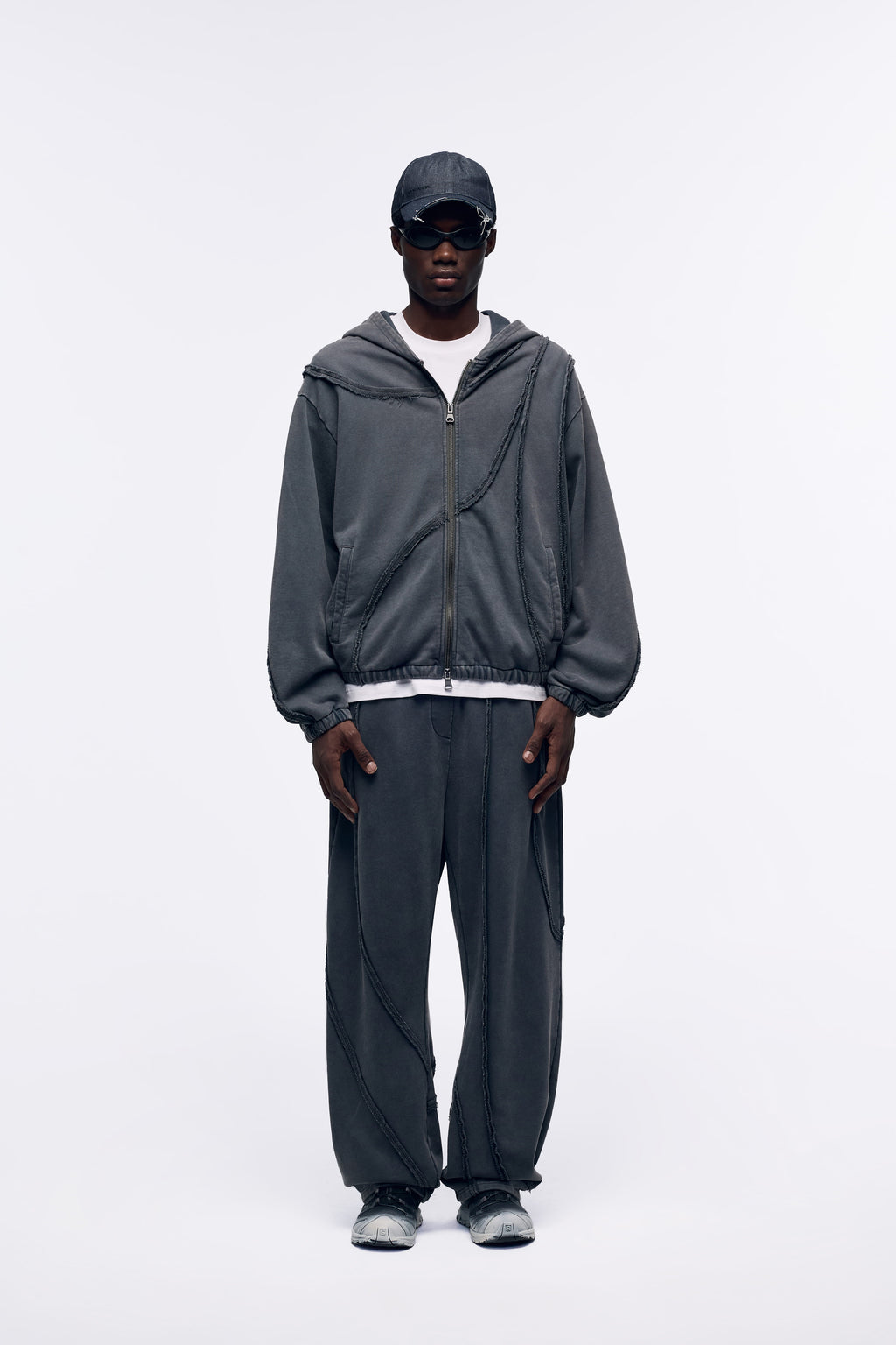 Ventarra unisex washed oversized sweat jacket in Washed Gray — deconstructed raw-edge seams, deep water-wash heavyweight cotton with wizard-hat hood and elastic cuffs