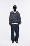Ventarra unisex washed oversized sweat jacket in Washed Gray — deconstructed raw-edge seams, deep water-wash heavyweight cotton with wizard-hat hood and elastic cuffs